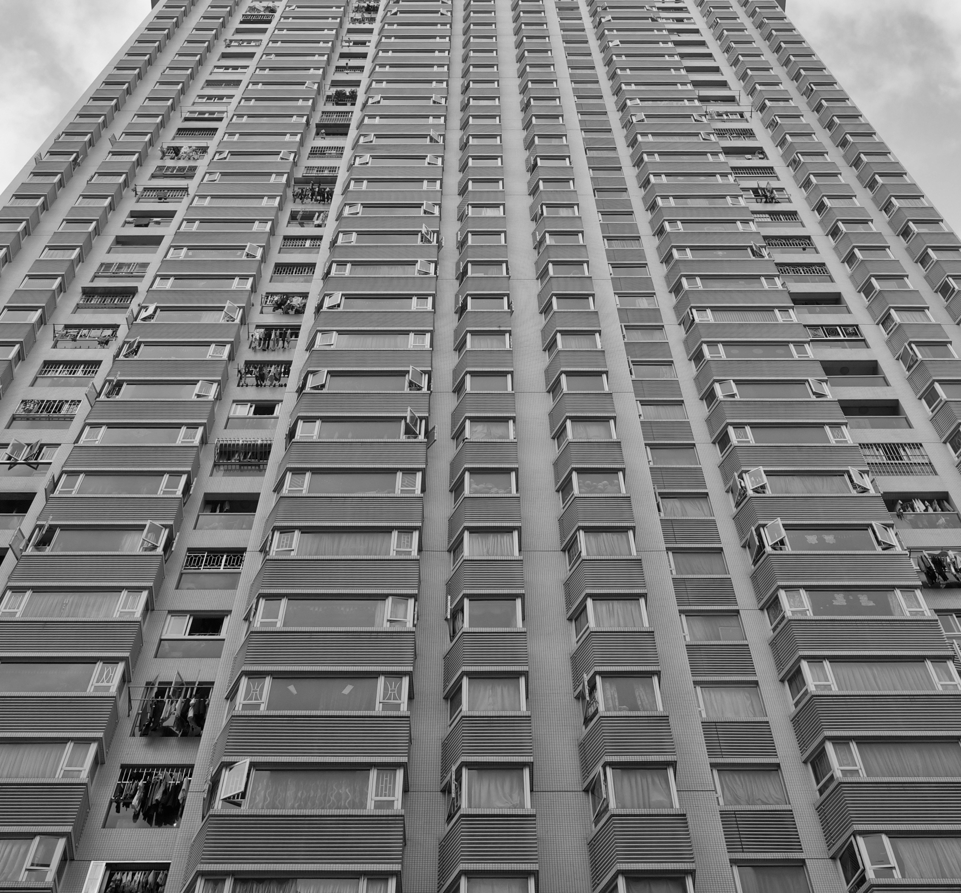 grayscale photo of high-rise building